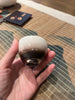 Handcrafted ceramic teacup by Taiwanese artist Ouyang You-Qi, featuring a minimalist silver-black glaze and flat ergonomic handle; part of YOSHANTEA’s limited artist collection.